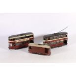 Three OO gauge scale electrically operated tram cars, two are signed "WM LITTLE TRANSPORT MANAGER"?,