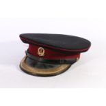 British Army uniform, a peaked cap with Royal Army Medical Corps IN ARDUIS FIDELIS badge, with