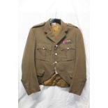 British Army uniform, a green khaki jacket with Meyer and Mortimer Ltd "Major J F Logan 1243