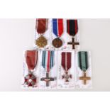 POLAND. Polish medals including Independence Cross 1918-1921, a Partisan Cross 1939-1945, a Janek