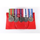 World War II five medal group including WWII Defence medal, WWII war medal, Elizabeth II