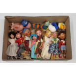 A collection of eleven Pelham Puppets including Noddy, Caterpillar, Donald Duck, Bride, Ermintrude