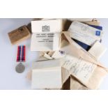 WITHDRAWN: WWII war medal in cardboard issue case addressed "J M Miller Whitley Bay" together with v