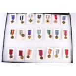 UNITED STATES OF AMERICA USA. A collection of forty-two American miniature medals including Army