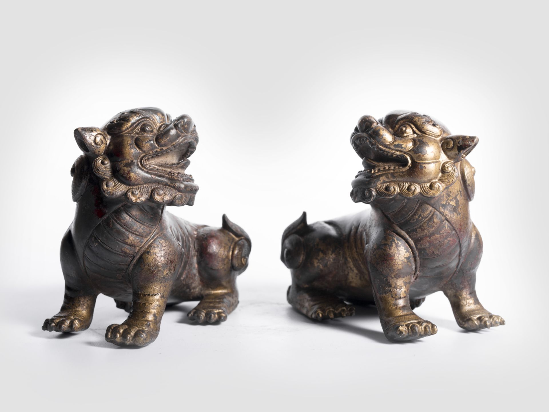 Pair of gilt bronze lions, China, Ming Dynasty, 1368 -1644