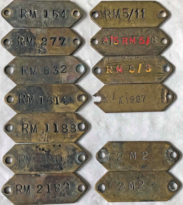 Selection (13) of London Transport brass VEHICLE TAGS, mainly Routemaster, and comprising tags for