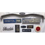 Selection (9) of Bristol VEHICLE PLATES & BADGES of various types and styles, including the top