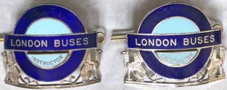 Pair of London Transport 'London Buses' (driving) Instructors' CAP BADGES, both are examples of