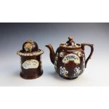 A Victorian bargeware treacle glazed tobacco jar and cover, late 19th century, the body with applied