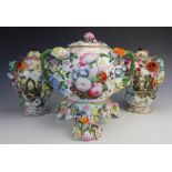 An English porcelain florally encrusted associated garniture of three, early 19th century,