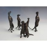 A bronze meercat family by Paul Jenkins, each modelled standing, the tallest 13cm high, with a