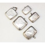 A selection of Victorian and later silver vesta cases, dated between 1897 - 1916, each of rounded