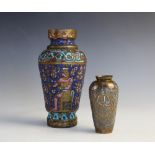 An Egyptian enamelled vase, late 19th century, of baluster form and externally decorated with a