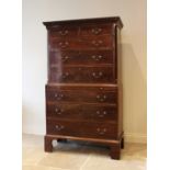 A 19th century Chippendale style mahogany chest on chest, the upper chest with a Greek key pattern