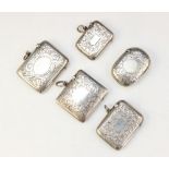 A selection of Victorian and later silver vesta cases, dated between 1893 - 1919, each of rounded