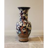 A Chinese floor standing vase, of baluster form with extended flared neck, the cobalt blue ground