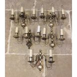 A set of five white metal Dutch style wall light fittings, 20th century, the knopped wall brackets