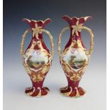 A pair of English porcelain vases, mid 19th century, each of baluster form with shaped rim, palm