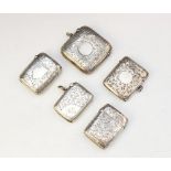 A collection of five Victorian and later silver vesta cases, dated between 1876 - 1914, all with