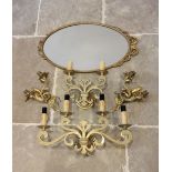 A 19th century Dutch style four branch brass wall light fitting, of scrolling form along with a