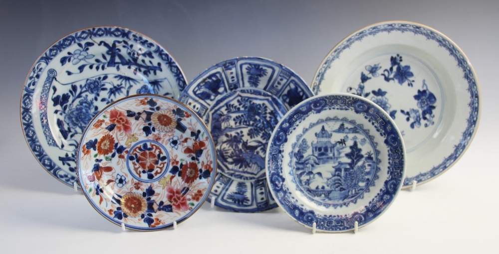 A collection of 18th century and later Chinese blue and white porcelain dinner wares, to include a