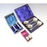 A cased set of four Victorian Apostle type spoons Martin Hall and Co, each with figural terminal,