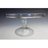 A glass tazza or stand, of large proportions, late 18th/early 19th century, the lipped top raised on