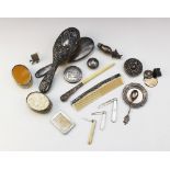 A selection of silver and white metal wares, to include; a Continental silver compact of circular