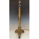 A brass tilt top table lamp in the manner of William Bullock, early 20th century, the body comprised