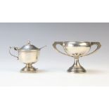 An Art Deco miniature silver twin-handled trophy by Emile Viner, Sheffield 1934, of compressed