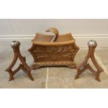 A pair of carved oak Gothic revival candlesticks, 28cm high, and a carved oak canterbury with