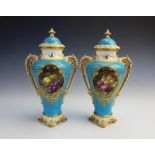 A pair of Coalport porcelain vases and covers, late 19th century, each of inverted baluster form