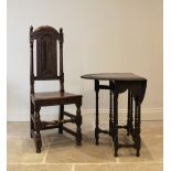 A 17th century style oak hall chair, 20th century, the carved splat back flanked by ring turned