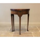 A George II style demi-lune mahogany folding side table, early 20th century, the circular top