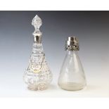 A silver mounted glass decanter and stopper, Mappin and Webb London 1935, of faceted form, 30 cm