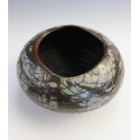 A studio pottery bowl probably Nicolas Vergette, 12.5cm high, with a Poole Pottery Delphis bowl,
