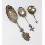 A Continental (possibly Dutch) silver spoon, indistinctly marked, with embossed decoration to