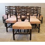 A set of ten Chippendale style mahogany dining chairs, early 20th century, each with a pierced