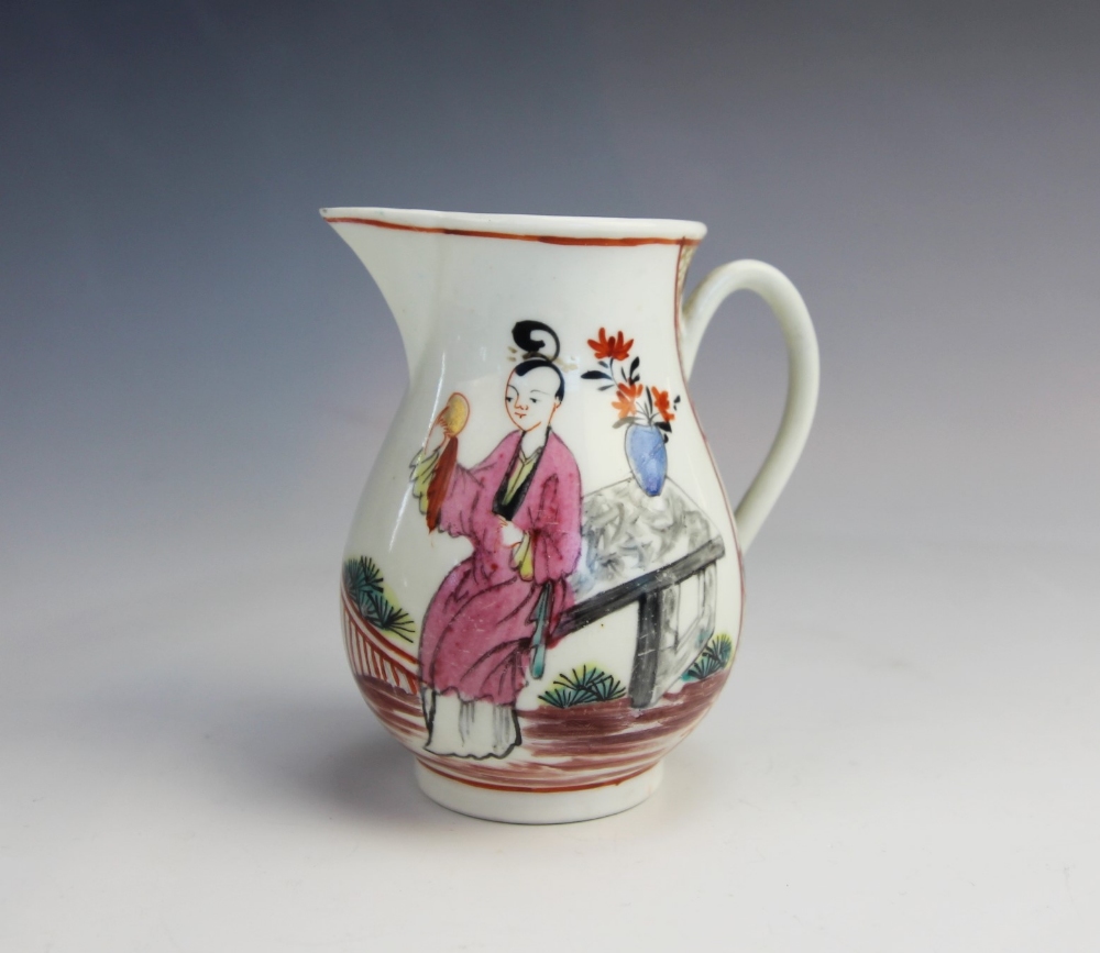 A Worcester sparrow beak cream jug, circa 1775, decorated in polychrome enamels with figures on a