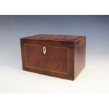 A 19th century mahogany tea caddy, of rectangular form, the hinged cover inlaid with twin