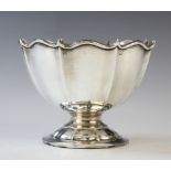 An Edwardian silver sugar bowl, A & J Zimmerman Ltd Birmingham 1906, of pedestal form with ogee