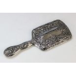 An Edwardian silver mounted mirror by Henry Matthews, Birmingham 1901, of rectangular form with