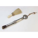 A 19th century white metal mounted fly whisk,
