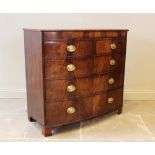 A 19th century bowfront mahogany chest of drawers, with an arrangement of two short over three