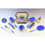 A George V silver and guilloche enamel fifteen piece dressing table set by Albert Carter, Birmingham