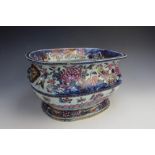 An 18th century Chinese porcelain wine cistern/cooler, Qianlong (1736-1795), of oval form and