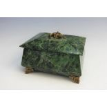 A green serpentine casket, possibly Russian, 19th century, the rectangular casket with applied