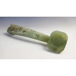 A Chinese jade ruyi sceptre, 20th century, the sceptre of large proportions carved with lotus blooms