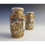 A pair of Japanese Satsuma vases, Meiji period (1868-1912), each of cylindrical form and extensively