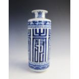 A Chinese porcelain blue and white rouleau vase, 19th century, the body with zhuan shu style